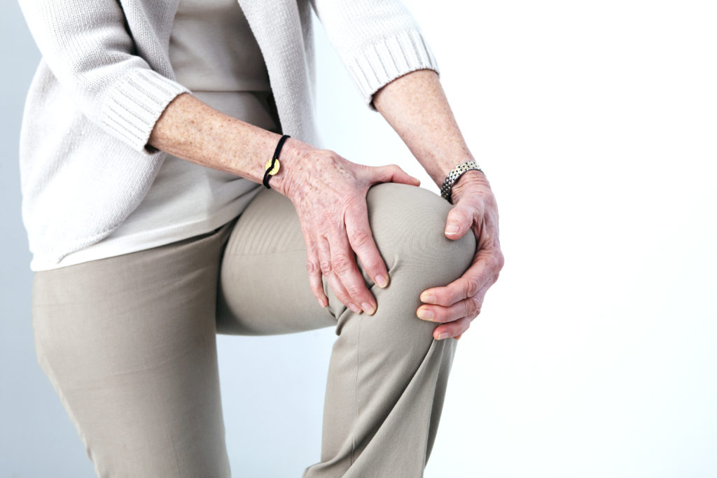 A Woman Experiencing Pain Due To Premature Failure Of The Attune Knee System