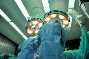 Doctors performing a depuy ASR hip replacement