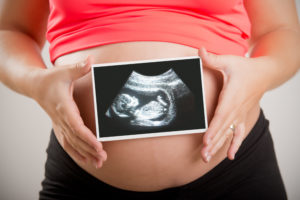 A Pregnant Woman And Her Unborn Child Who Are At Risk Of Complications Caused By Zoloft